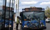 83 route at bus stop in East Hartford. Image of bus at stop